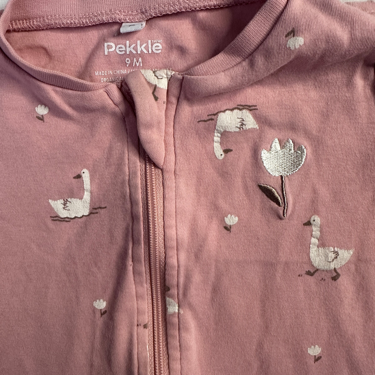 Grenouillère à motifs de cygnes